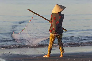 Vietnam, Mui Ne, Mui Ne Beach, Net Fisherwoman Vietnam, Mui Ne, Mui Ne Beach, Net Fisherwoman