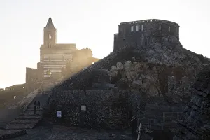 View of the church of San Pietro at sunset, Porto Venere, La Spezia district, Liguria View of the church of San Pietro at sunset, Porto Venere, La Spezia district, Liguria