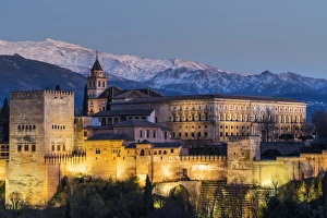 Images Dated 6th March 2016: View at dusk of Alhambra palace with the snowy Sierra Nevada in the background, Granada