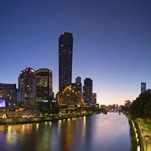 View of Eureka Tower and skyline along Yarra River at dusk, Melbourne, Victoria View of Eureka Tower and skyline along Yarra River at dusk, Melbourne, Victoria