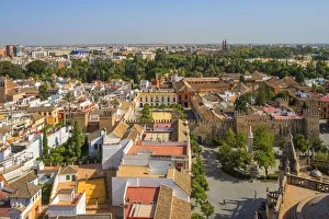 View from the Giralda tower of the Cathedral on the Real Alcazar and Sevilla, UNESCO View from the Giralda tower of the Cathedral on the Real Alcazar and Sevilla, UNESCO