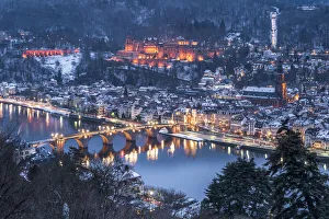 View of the old town of Heidelberg seen from the Philosophers Way in winter at night View of the old town of Heidelberg seen from the Philosophers Way in winter at night