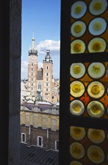 View of St Marys Church through window of Town Hall Tower, Krakow, Poland View of St Marys Church through window of Town Hall Tower, Krakow, Poland