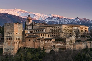 Images Dated 6th March 2016: View at sunset of Alhambra palace with the snowy Sierra Nevada in the background