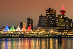 View at sunset of Canada Place and Harbour Centre building decorated with Christmas lights View at sunset of Canada Place and Harbour Centre building decorated with Christmas lights