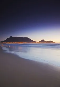 View of Table Mountain at sunset from Milnerton beach, Cape Town, Western Cape, South View of Table Mountain at sunset from Milnerton beach, Cape Town, Western Cape, South