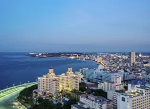 View over Vedado towards Hotel Nacional and El Malecon at dusk, Havana View over Vedado towards Hotel Nacional and El Malecon at dusk, Havana