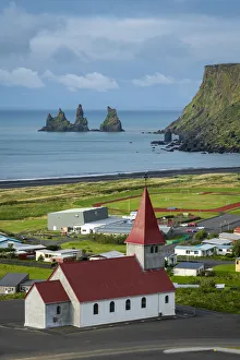 Sudurland Region Gallery: Vik i Mydral Church in Vik with Reynisdrangar rock formation in background, Vik i Mydral