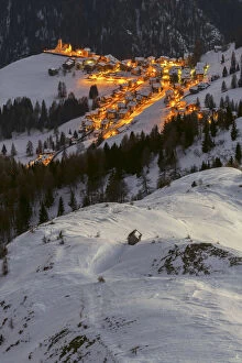 Winter Landscape Gallery: The village of Colle Santa Lucia, seen from above on a cold winter evening, Belluno