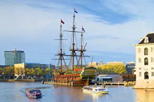 VOC ship and National Maritime Museum in Oosterdok, Amsterdam, Netherlands VOC ship and National Maritime Museum in Oosterdok, Amsterdam, Netherlands