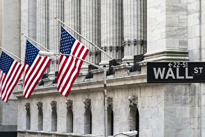 Wall Street sign with New York Stock Exchange behind, Lower Manhattan, New York, USA Wall Street sign with New York Stock Exchange behind, Lower Manhattan, New York, USA
