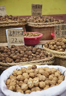 Walnuts at market, Guangzhou, Guangdong, China Walnuts at market, Guangzhou, Guangdong, China