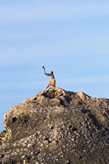 Warrior on rock, Kuata Island, Yasawa Islands, Fiji Warrior on rock, Kuata Island, Yasawa Islands, Fiji