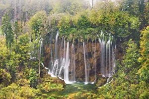 Waterfall in deciduous forest in autumn - Croatia, Lika-Senj Waterfall in deciduous forest in autumn - Croatia, Lika-Senj