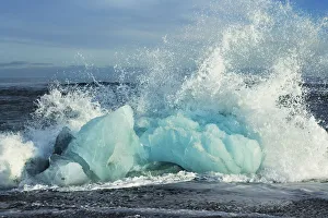 Vatnajokull National Park Gallery: Wave breaking at iceblocks washed ashore - Iceland, Eastern Region