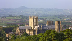 Wells Cathedral and Glastonbury Tor on a misty Spring morning, Wells, Somerset, England Wells Cathedral and Glastonbury Tor on a misty Spring morning, Wells, Somerset, England