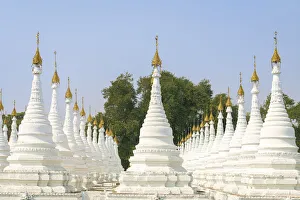 White stupas of Sanda Muni Pagoda (AKA Sanda Mu Ni, Sandamani and Sandamuni), Mandalay White stupas of Sanda Muni Pagoda (AKA Sanda Mu Ni, Sandamani and Sandamuni), Mandalay