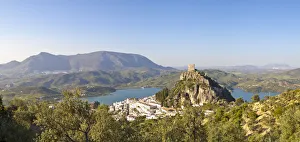The whitewashed village of Zahara de la Sierra dominated by Moorish castle, Zahara The whitewashed village of Zahara de la Sierra dominated by Moorish castle, Zahara