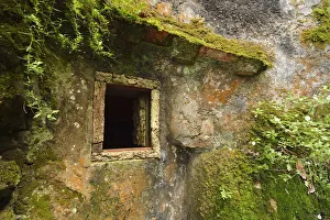 A window of the Convent of the Capuchos, dating back to the 16th century, in the middle A window of the Convent of the Capuchos, dating back to the 16th century, in the middle