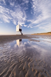 Wooden lighthouse on Burnham beach at low tide, Burnham-on-Sea, Somerset, England. Winter Wooden lighthouse on Burnham beach at low tide, Burnham-on-Sea, Somerset, England. Winter