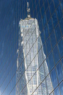 One World Trade Center or Freedom Tower reflected in a glassy building, Lower Manhattan One World Trade Center or Freedom Tower reflected in a glassy building, Lower Manhattan