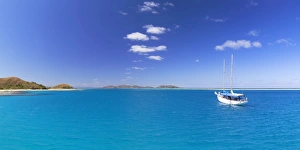 Yacht in lagoon of Mana Island, Mamanuca Islands, Fiji Yacht in lagoon of Mana Island, Mamanuca Islands, Fiji