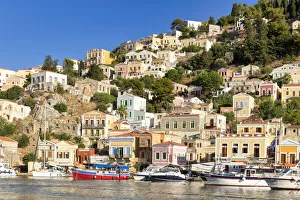 Yachts in Gialos Harbour, Symi Island, Dodecanese Islands, Greece Yachts in Gialos Harbour, Symi Island, Dodecanese Islands, Greece