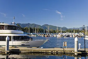 Yachts moored in Coal Harbour, Vancouver, British Columbia, Canada Yachts moored in Coal Harbour, Vancouver, British Columbia, Canada