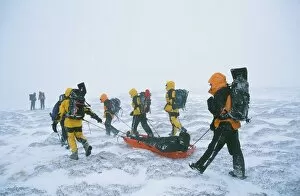 Mountain rescue team members in the Scottish Highlands