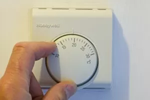 Climate Change Gallery: setting the central heating thermostat at a cooler temperature to save energy