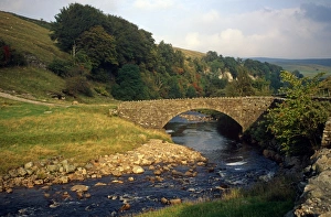 Stone bridge over the river. Arkengarthdale, Yorkshire Dales National Park, England. 2001 Stone bridge over the river. Arkengarthdale, Yorkshire Dales National Park, England. 2001