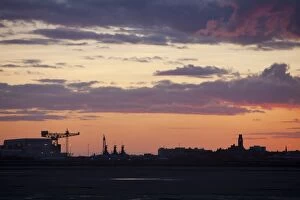 Images Dated 8th July 2009: Sunset over Barrow in Furness town and shipyard, Cumbria, UK