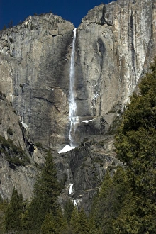Upper Yosemite Falls with snow on the bottom, Yosemite National Park, California, USA Upper Yosemite Falls with snow on the bottom, Yosemite National Park, California, USA