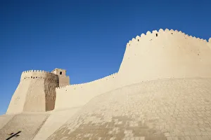 Akshi Bobo, a tower of Kunya Ark, on left, and outer wall of Ichan Kala, Khiva Akshi Bobo, a tower of Kunya Ark, on left, and outer wall of Ichan Kala, Khiva