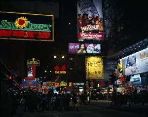 Images Dated 25th March 2009: CHINA, Hong Kong, Kowloon Illuminated advertising hoarding