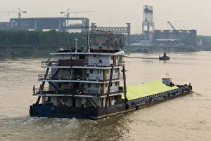 China, Hubei, Yangtze Barge carrying sulphur on the Yangtze River east of Wuhan China, Hubei, Yangtze Barge carrying sulphur on the Yangtze River east of Wuhan