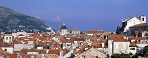 Croatia Dalmatia Dubrovnik View through a slit in the city walls looking over rooftops Croatia Dalmatia Dubrovnik View through a slit in the city walls looking over rooftops