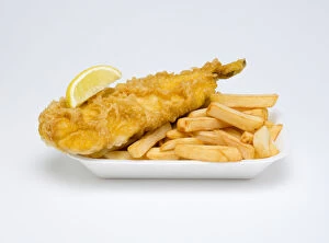 Food, Cooked, Fish, A portion of battered deep fried cod with a slice of lemon