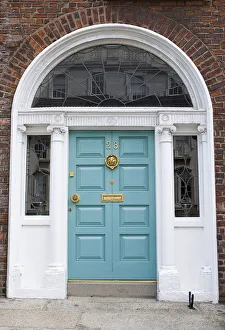 Georgian doorway near Merrion Square with light blue door and arched white surround Georgian doorway near Merrion Square with light blue door and arched white surround