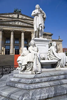 Germany, Berlin, Mitte, The Gendarmenmarkt square with a statue of the German poet