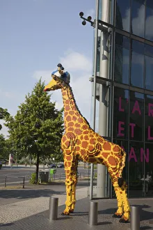 Germany, Berlin, Mitte, Potsdamer Platz, Model of Giraffe outside the Legoland Discovery Germany, Berlin, Mitte, Potsdamer Platz, Model of Giraffe outside the Legoland Discovery