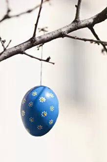 Hand-painted egg shell hanging from a branch to celebrate Easter at the Old Vienna Easter