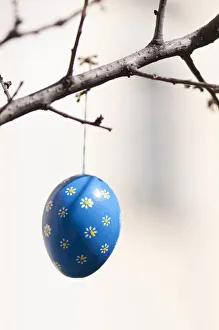 Hand-painted egg shell hanging from a branch to celebrate Easter at the Old Vienna Easter Hand-painted egg shell hanging from a branch to celebrate Easter at the Old Vienna Easter