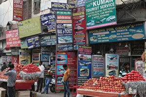 India, New Delhi, Advertisement boards and hoardings for travel services in the Paharganj district of Delhi