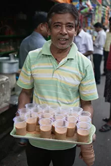 Food markets, india west bengal kolkata chai vendor tray tea