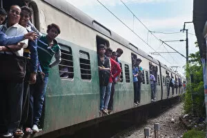 India, West Bengal, Kolkata, An overcrowded train at Garia Railway Station