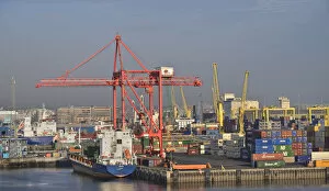 Ireland, County Dublin, Dublin Ferryport, cranes and freight containers seen from departing ferry vessel