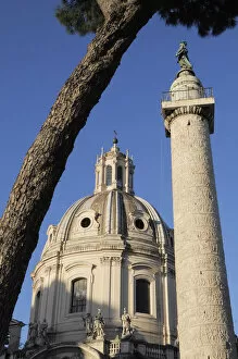 Italy, Lazio, Rome, Fori Imperiali, Trajan's Column with church dome & umbrella pine