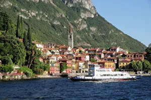 Italy, Lombardy, Lake Como, Varenna with ferry passing Italy, Lombardy, Lake Como, Varenna with ferry passing