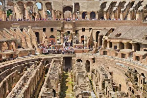 Italy, Rome, The Colosseum amphitheatre built by Emperor Vespasian in AD 80 with the interior thronged with tourists Italy, Rome, The Colosseum amphitheatre built by Emperor Vespasian in AD 80 with the interior thronged with tourists